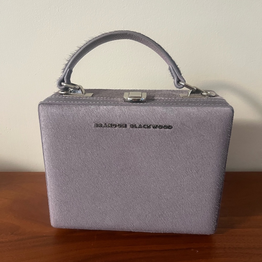 Brandon Blackwood Purple Ponyhair Kendrick Trunk
